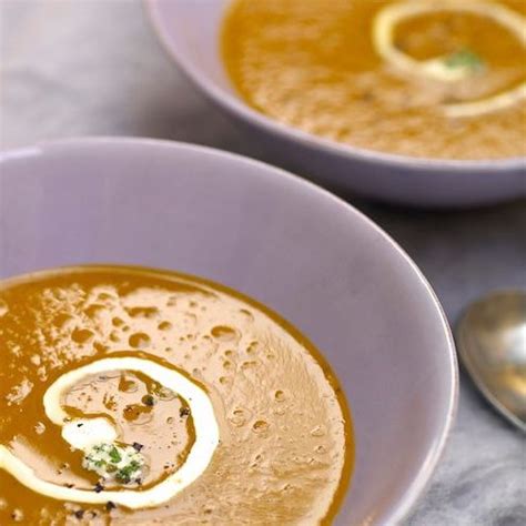 oven-roasted-pumpkin-soup-with-maple-thyme-cream image