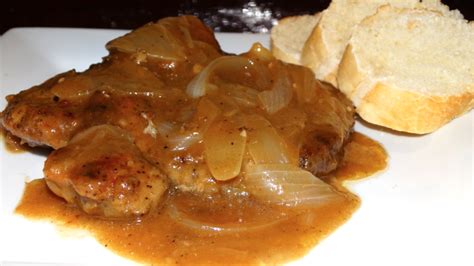 smothered-pork-chops-with-onions-and-gravy image