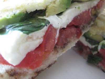 pressed-mozzarella-tomato-and-fresh-basil-sandwich image