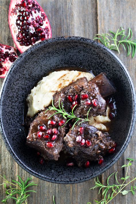 braised-short-ribs-with-pomegranate-molasses-butter image