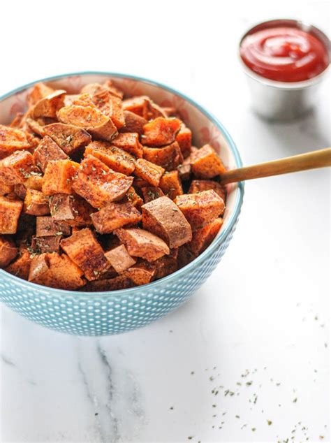 oven-roasted-cinnamon-sweet-potatoes-cubed-eats image