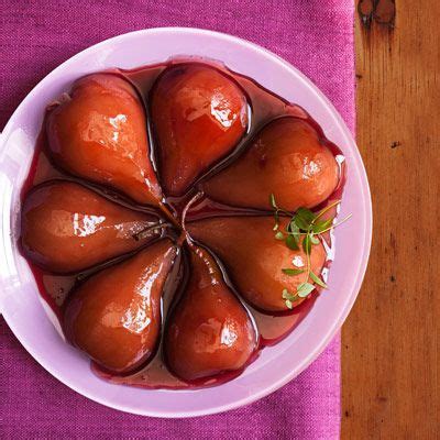 pomegranate-poached-pears-recipe-delish image