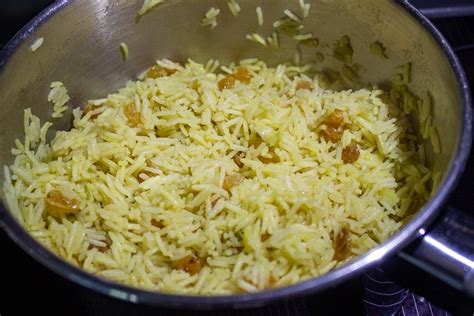 easy-curried-rice-with-raisins-two-kooks-in-the-kitchen image