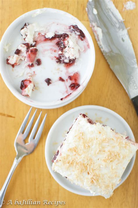 raspberry-coconut-poke-cake-a-bajillian image