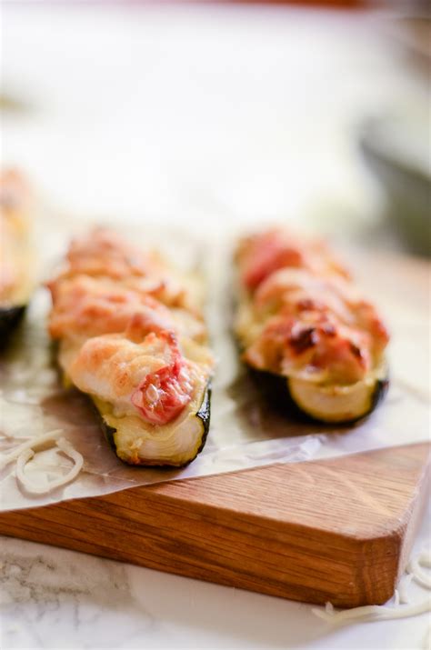 crab-and-artichoke-stuffed-zucchini-food-above-gold image