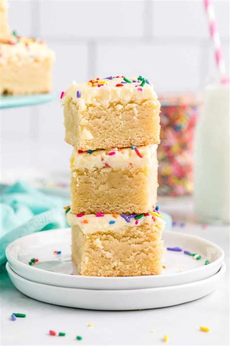 frosted-sugar-cookie-bars-crayons-cravings image