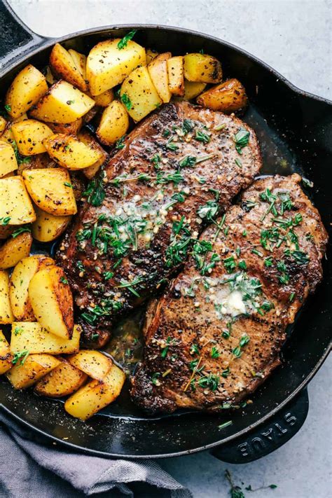 skillet-garlic-butter-herb-steak-and-potatoes-the image