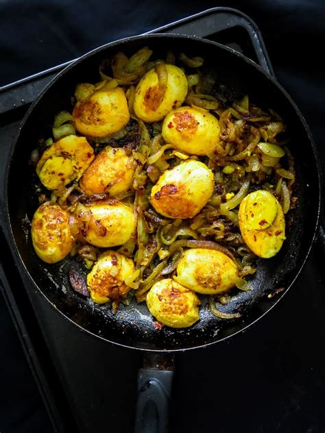 curried-egg-stir-fry-with-caramalised-onions-sri-lankan image