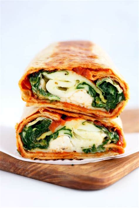 spinach-feta-wrap-with-sun-dried-tomatoes-pinch image