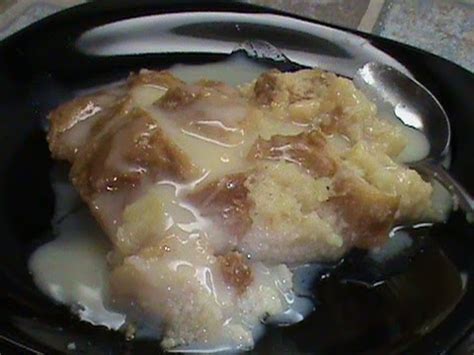 bread-pudding-with-hot-buttered-rum-sauce-youtube image