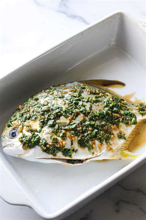 whole-baked-pompano-with-lemon-ginger-sauce-the image