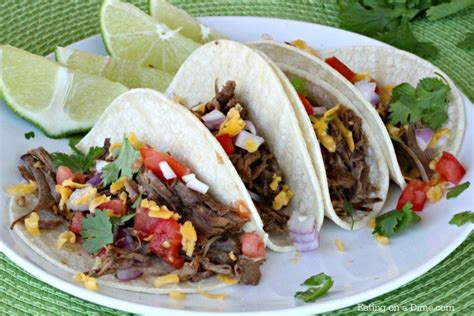 crock-pot-mexican-shredded-beef-taco-recipe-eating image