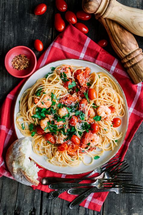 pasta-with-spicy-garlic-shrimp-burst-grape-tomatoes image