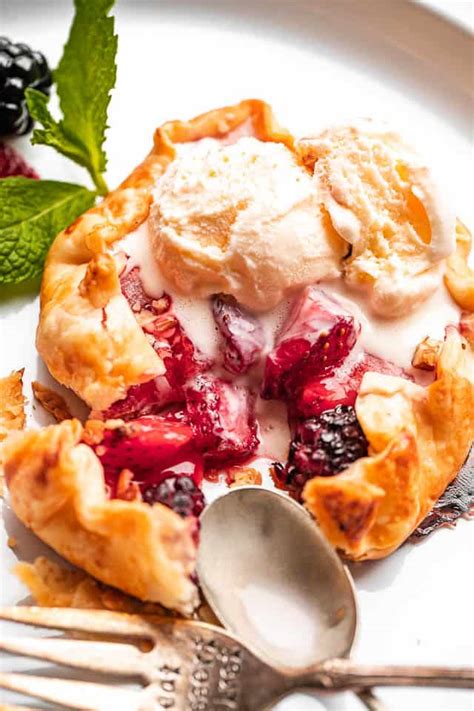 mini-mixed-berry-galettes-easy-weeknight image