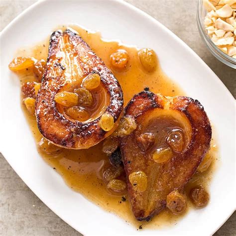 roasted-pears-with-golden-raisins-and-hazelnuts image