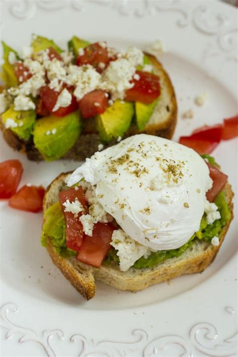 avocado-tomato-and-feta-toast-with-poached-eggs image
