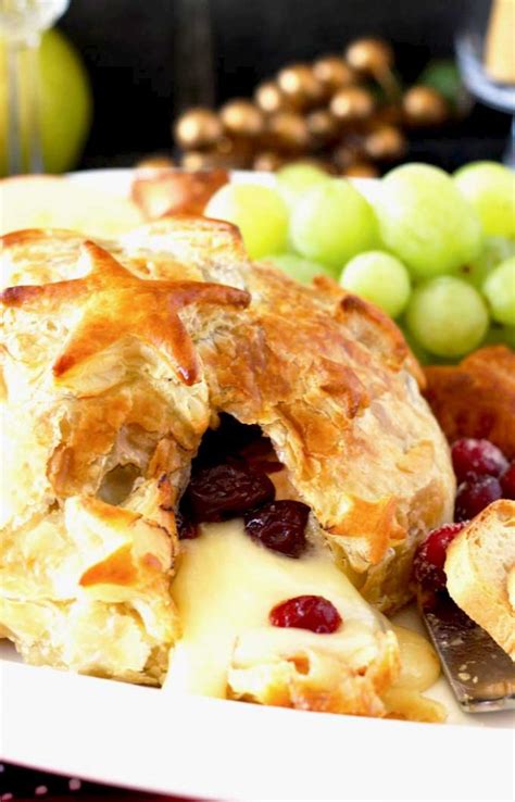 baked-brie-in-puff-pastry-with-cranberries-lemon image