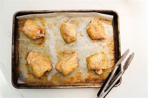 basic-roasted-chicken-thighs-the-daily-meal image