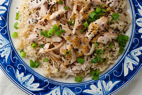 sake-steamed-chicken-with-ginger-and-scallions image