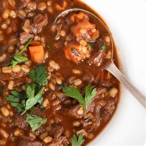 classic-beef-and-barley-soup-seasons-and-suppers image