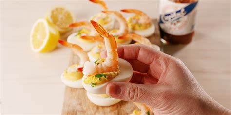 best-shrimp-cocktail-deviled-eggs-recipe-delish image