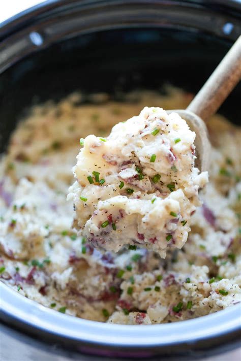 slow-cooker-garlic-mashed-potatoes-damn-delicious image