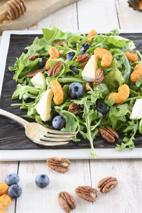 blueberry-brie-pecan-salad-with-protein-puff-croutons image