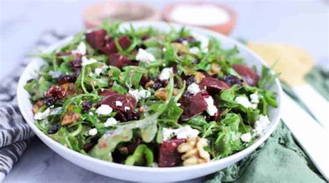 beet-salad-with-arugula-and-walnuts-clean-delicious image