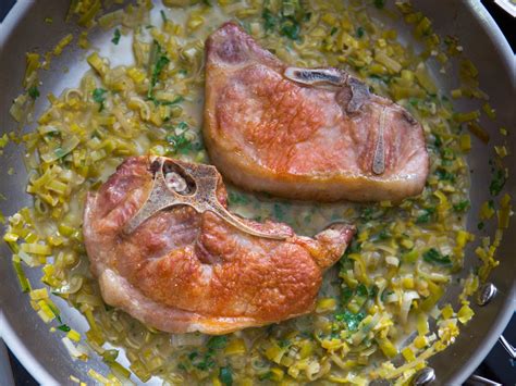 pork-chops-with-white-wine-and-leek-pan-sauce-recipe-serious image