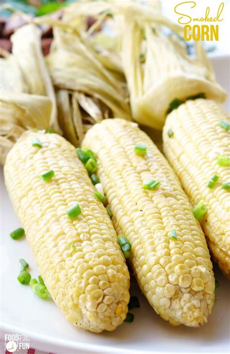 smoked-corn-on-the-cob-recipe-with-butter-and-green image