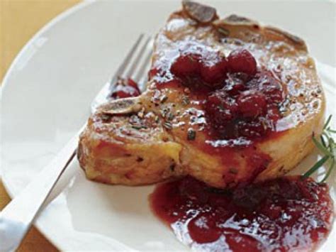 pork-chops-with-cranberry-port-and-rosemary-sauce image