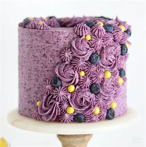 lemon-layer-cake-with-blueberry-buttercream-sugar image