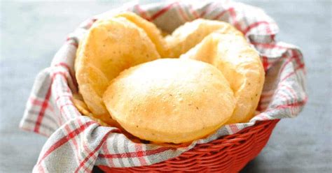 crispy-and-fluffy-puri-recipe-fried-indian-poori-bread image