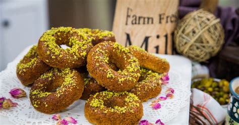 pistacho-and-cardamom-doughnuts-with-rosewater-glaze image