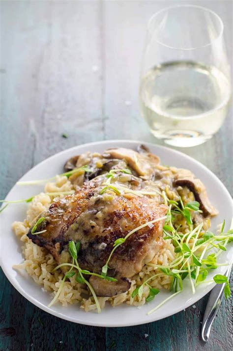 dutch-oven-chicken-thighs-with-leeks-mushrooms image