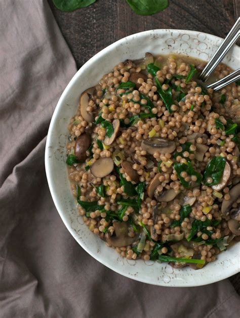 israeli-couscous-risotto-with-mushrooms-and-spinach image