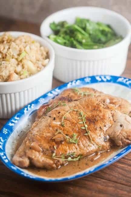 pork-chops-with-cider-pan-sauce-healthy-delicious image