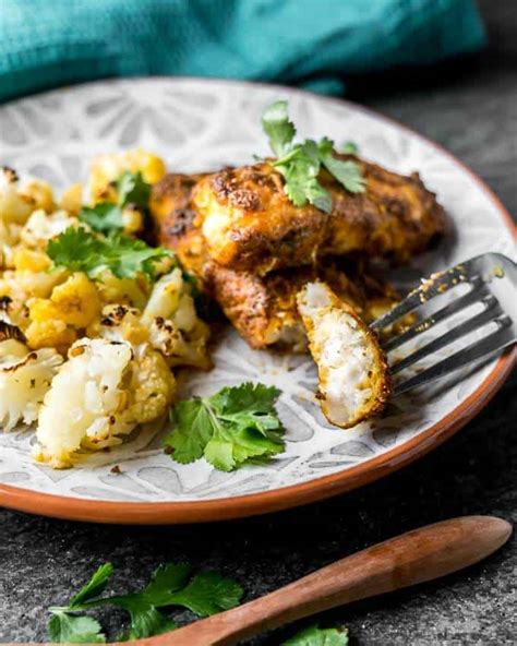 one-pan-tandoori-fish-and-garlic-butter-cauliflower image