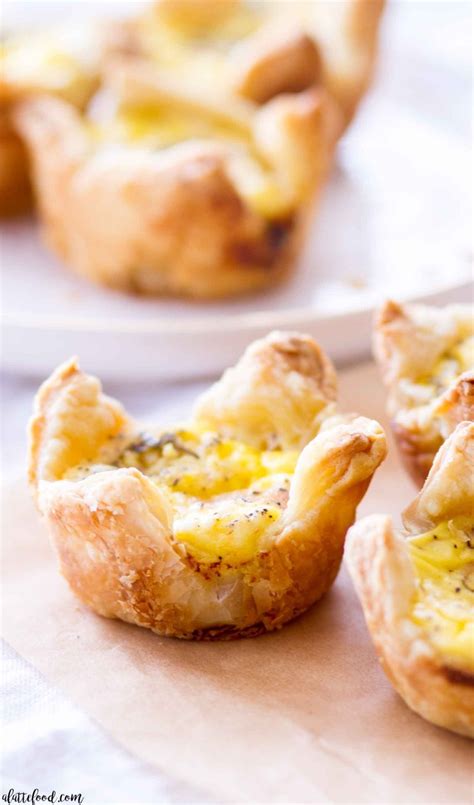 cheddar-and-ham-quiche-cups-a-latte-food image