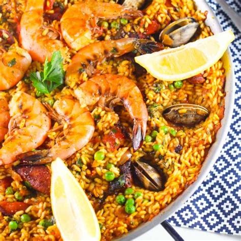easy-seafood-paella-recipe-with-saffron-aioli-platings image
