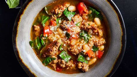 spicy-sausage-and-collard-soup-better-homes-gardens image
