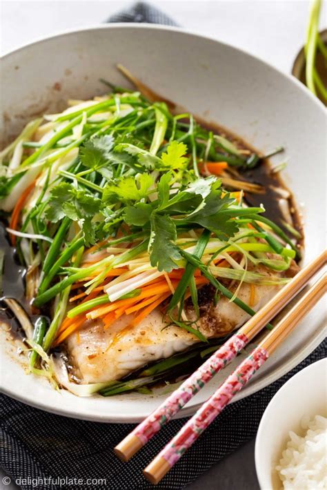 steamed-fish-with-ginger-and-soy-sauce-delightful-plate image