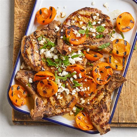 grilled-fennel-rubbed-pork-chops-apricots-eatingwell image