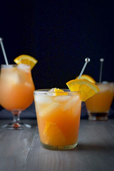 rum-swizzle-cocktail-dishes-delish image