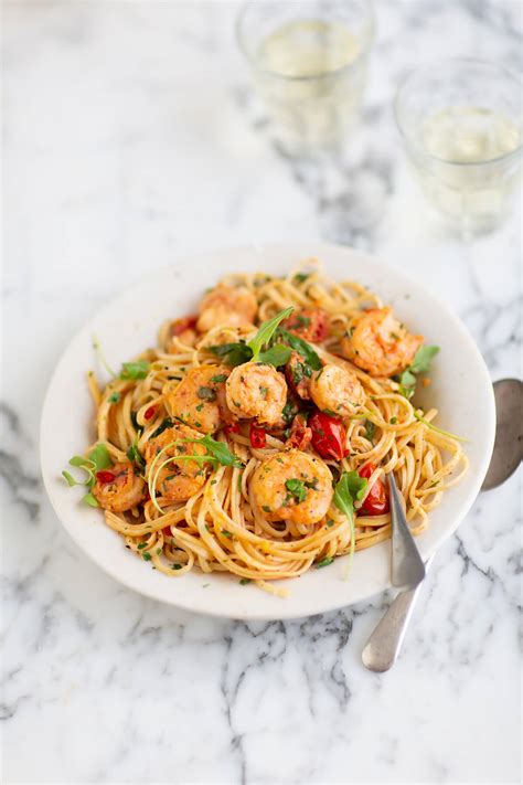 prawn-pasta-with-tomatoes-garlic-cream-drizzle image