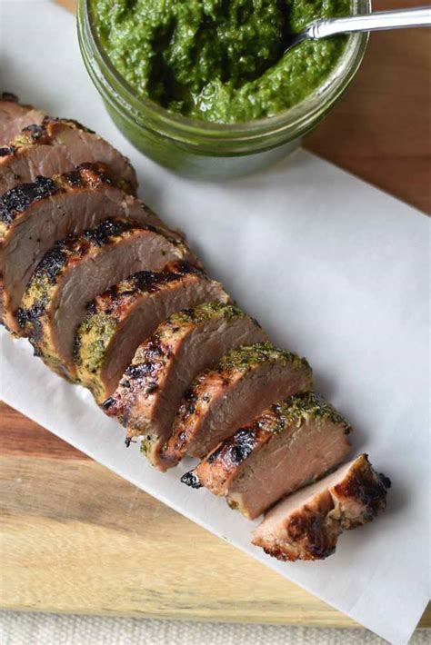chimichurri-pork-tenderloin-with-two-spoons image
