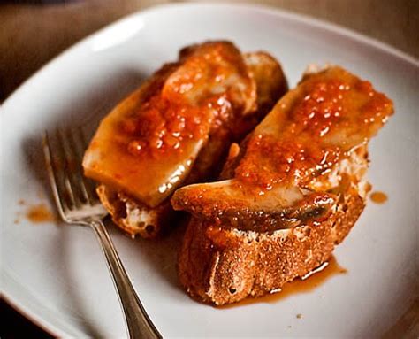 school-of-tapas-marinated-mushrooms-on-toast image