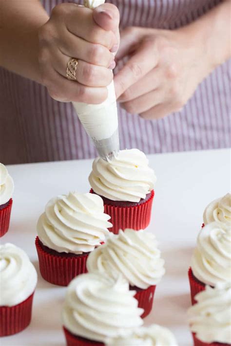 fluffy-cream-cheese-frosting-a-food-lovers-kitchen image