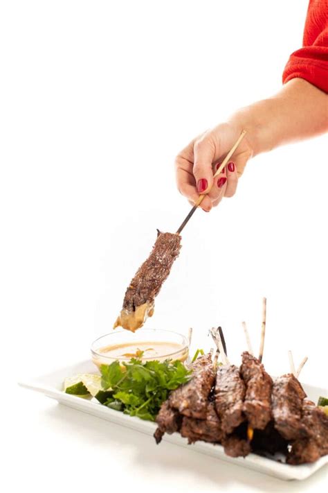 beef-satay-skewers-with-peanut-dipping-sauce-the image