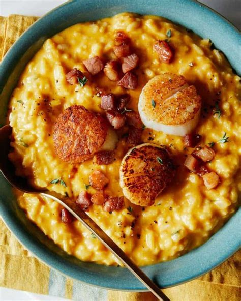 pumpkin-risotto-with-seared-scallops-spoon-fork-bacon image